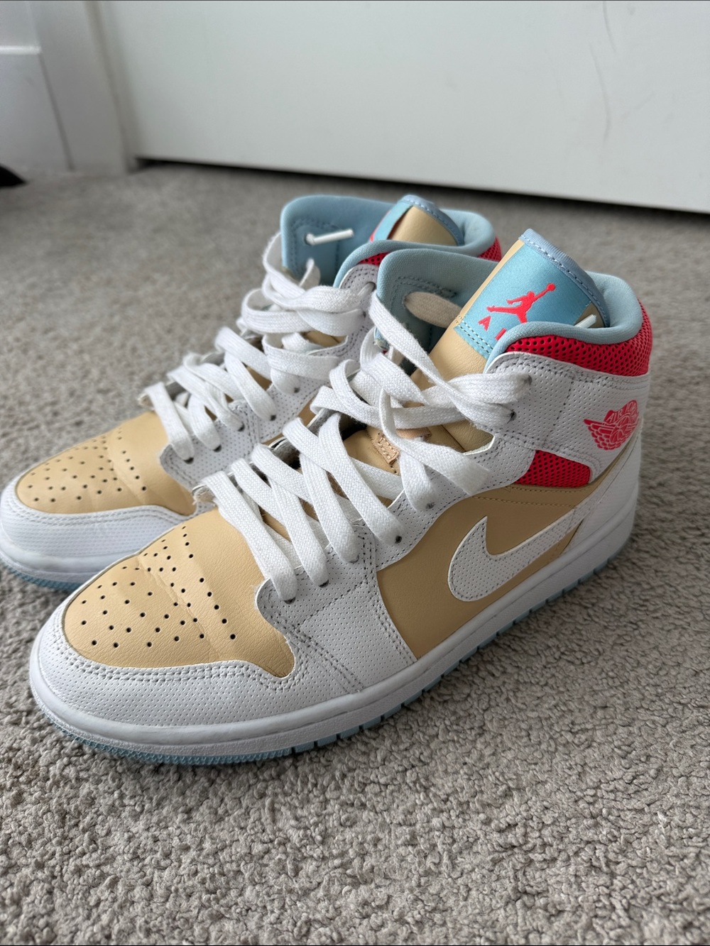 Jordan women’s High-Top Sneakers in White, Tan, Light Blue & Pink